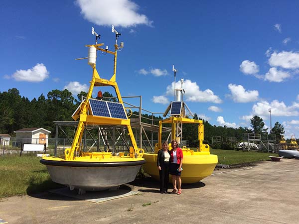 Zdenka and Kathleen O’Neil, Deputy Director, NDBC – old style buoys on the left, new SCOOP on the right.