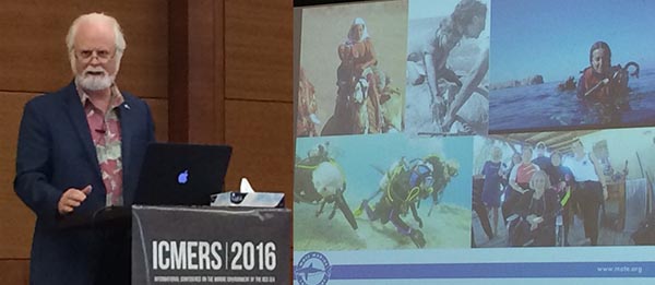 Michael Crosby addresses the assembly from the ICMERS 2016 podium.
