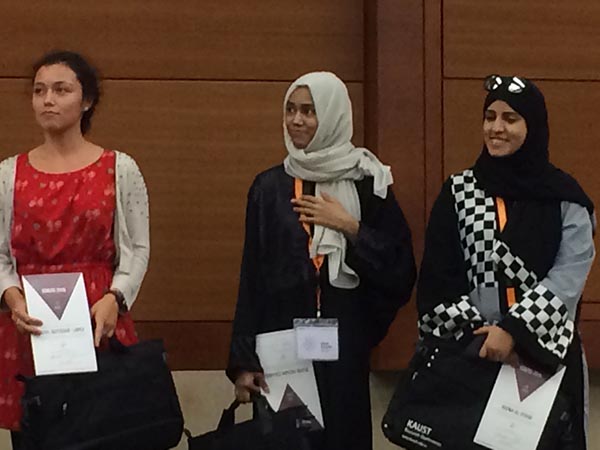 3 women receiving prizes for their posters at ICMER