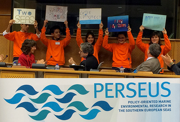 Photo collage of PERSEUS meeting banner and teen ambassadors on stage.